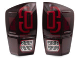 Raxiom 16-23 Toyota Tacoma XW Series Sequential LED Tail Lights- Black Housing- Red Lens